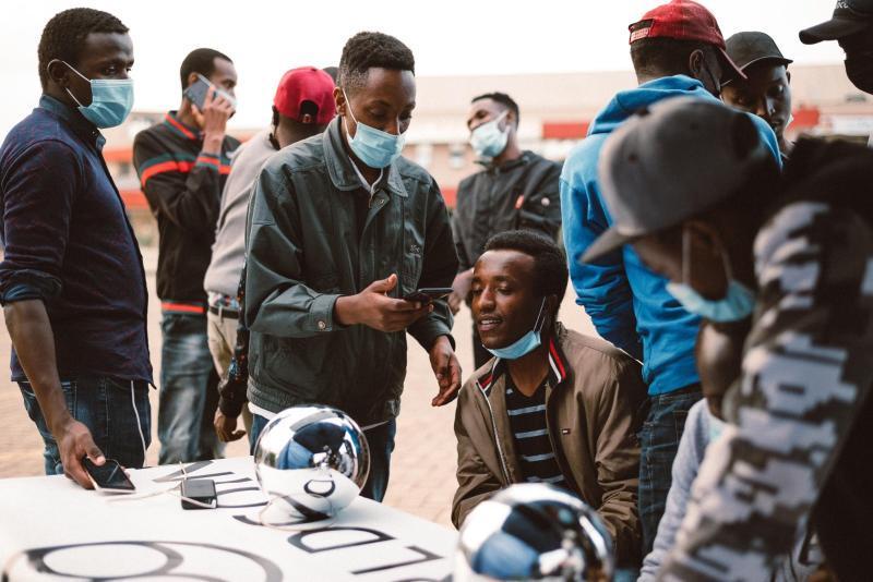 File image of youths applying for Worldcoin accounts.